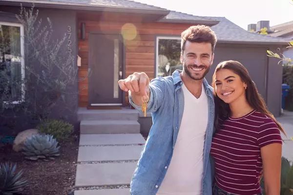 young couple buying home in Colorado
